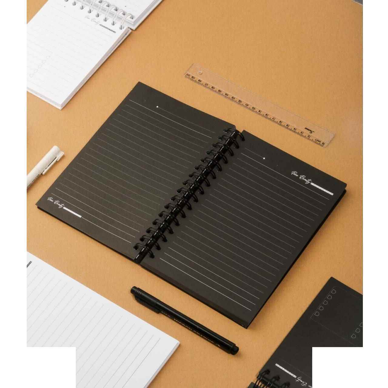 aea285e4-eac0-404c-9c94-8061624f9733.jpg دفتر100برگ A5 خطدار سیمی جلدسخت (کاغذ مشکی) برگ سری پیور بیوتی کد70706 - تصویر 1